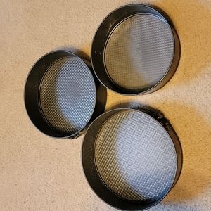 A set of 3 springform cake pans.